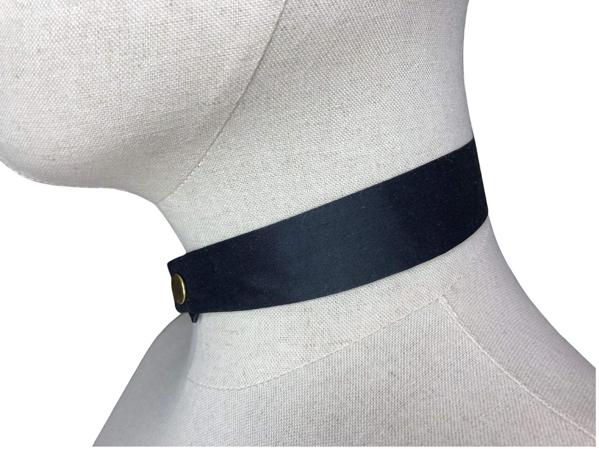 modern continental crossover black silk tie with gold pop stud