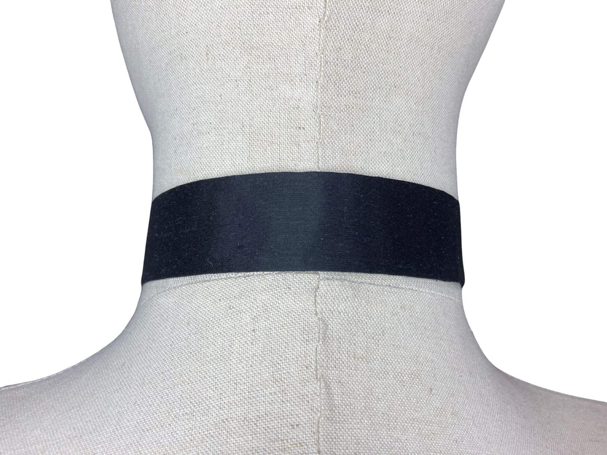 modern continental crossover black silk tie with gold pop stud