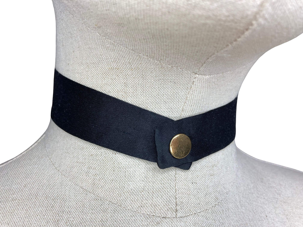 modern continental crossover black silk tie with gold pop stud