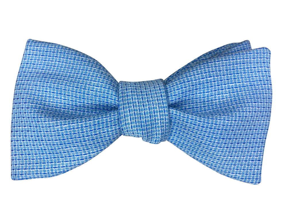 A sky blue bow tie with a fine basketweave pattern